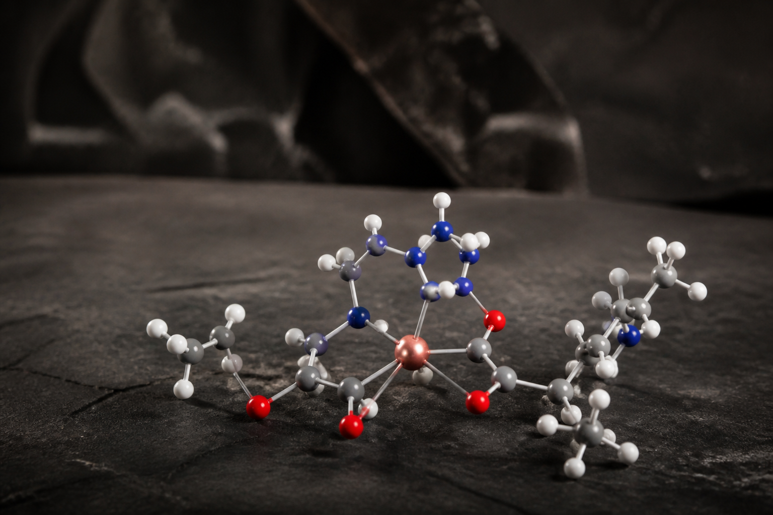Ball-and-stick model of a Gly-His-Lys copper(II) complex on charcoal stone